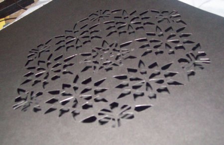 Pattern cut out from black card