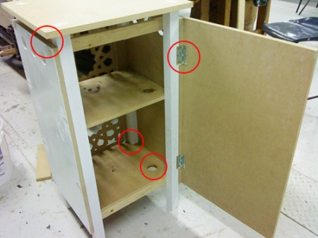 Top added, hinges added, holes for cables and two extra support beams aligned with the top and bottom of the door